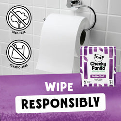 Roll of Cheeky Panda quilted toilet paper on a holder against a tiled bathroom wall.