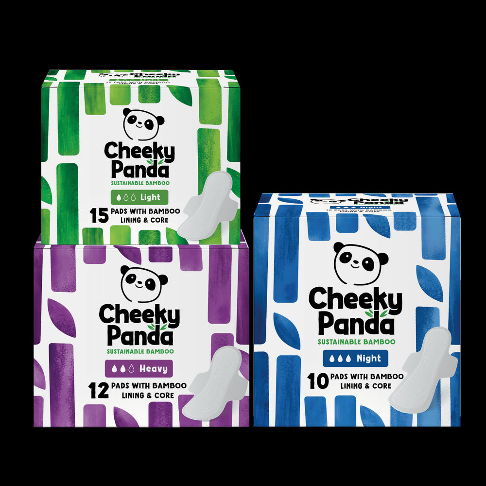 Three boxes of Cheeky Panda sustainable bamboo period pads on a white background