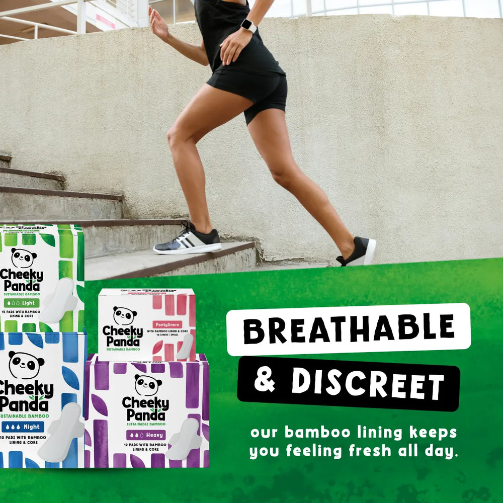 Person walking up stairs with Cheeky Panda product packaging displayed, emphasizing that our pads are breathable and discreet.