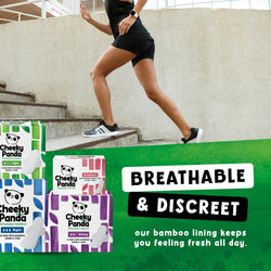 Person walking up stairs with Cheeky Panda period pads and liners packaging displayed, emphasizing breathable and discreet features.