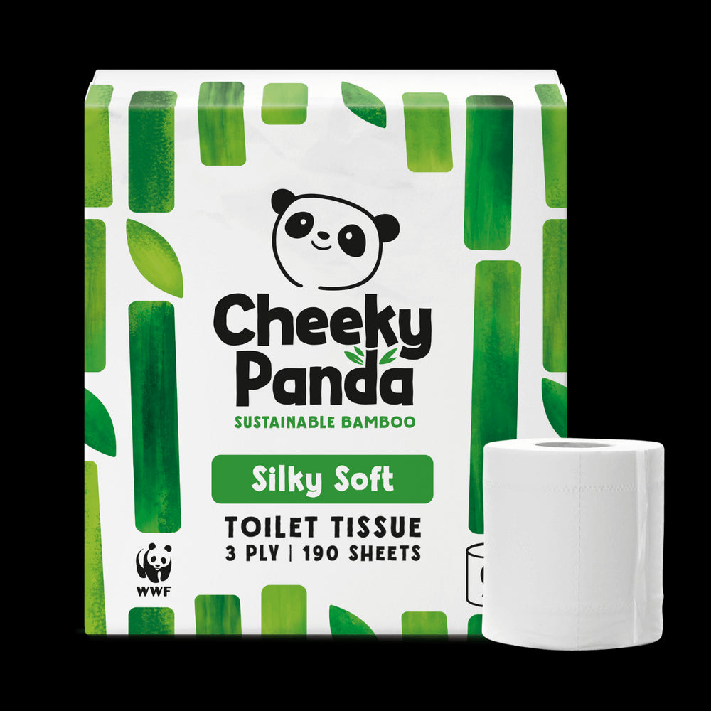 Cheeky Panda sustainable bamboo toilet paper packaging with a roll of toilet paper on a black background