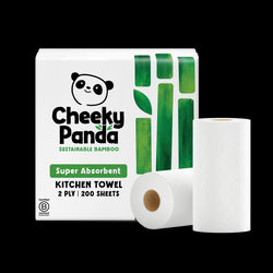 Cheeky Panda sustainable bamboo kitchen towel packaging with a roll of towels on a black background