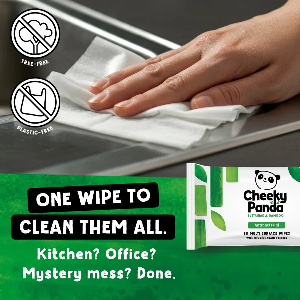 Hand using a Cheeky Panda wipe to clean a surface, with Cheeky Panda antibacterial wipes product packaging and promotional text.