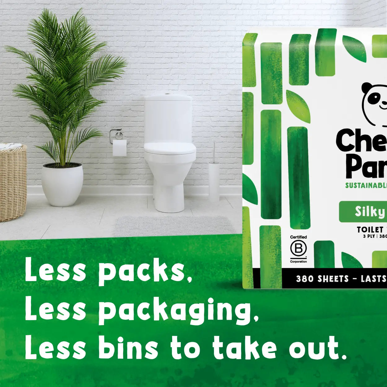 Toilet with a plant and a box of Cheeky Panda sustainable toilet paper with green packaging in a bathroom setting.