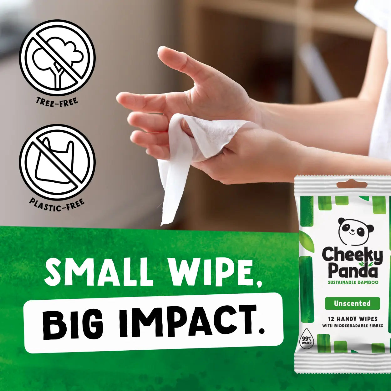 Person holding a wipe with Cheeky Panda packaging and sustainability icons on a blurred background