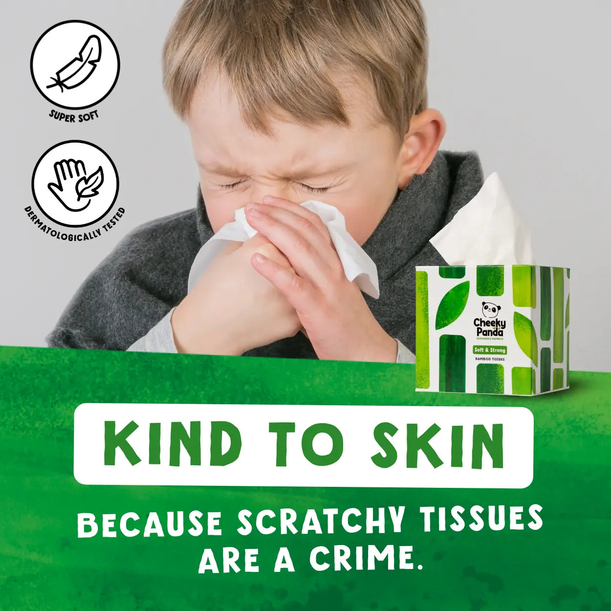 Child using tissues with a box of Cheeky Panda tissues that are kind to skin and non-irritating