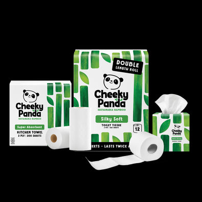 Cheeky Panda sustainable bamboo products including toilet tissue, kitchen towels, and rolls on a black background.