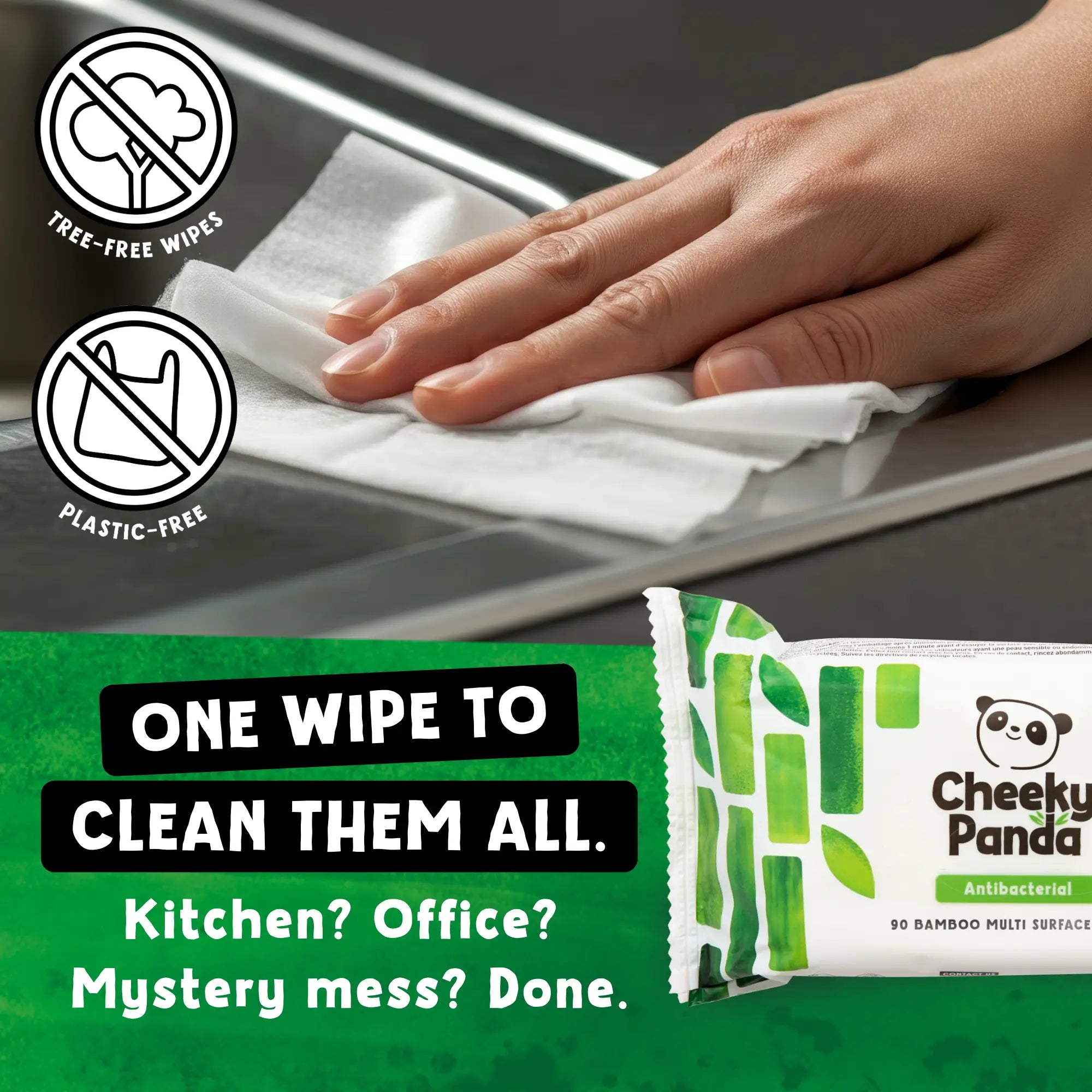 A hand cleaning a kitchen surface with a Cheeky Panda antibacterial wipe.