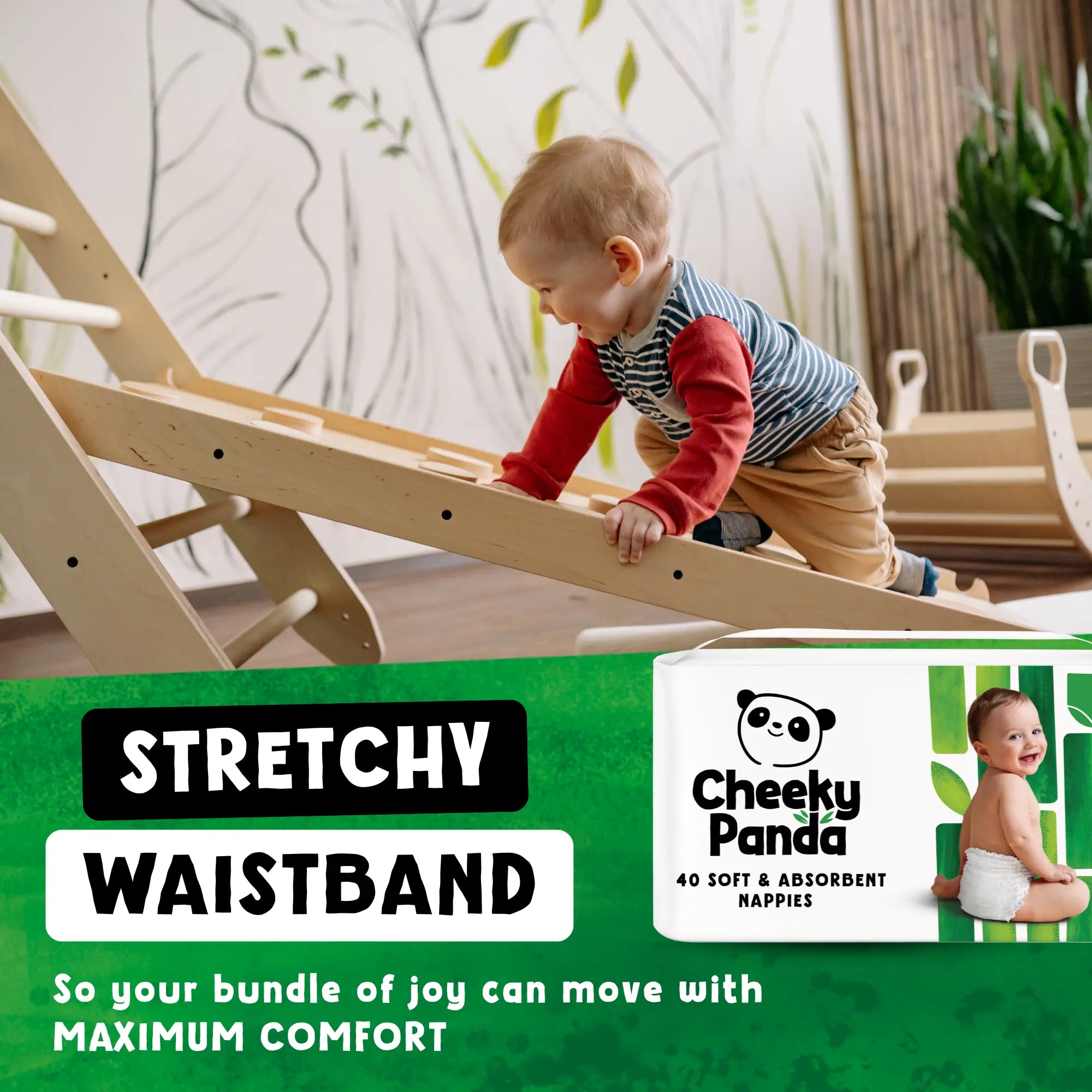 A baby playing with a pack of Cheeky Panda nappies, highlighting a stretchy waistband.