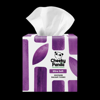 Box of Cheeky Panda tissues with a purple and white design on a black background